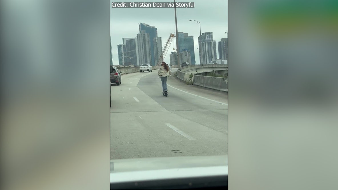 Woman spotted riding electric scooter in traffic